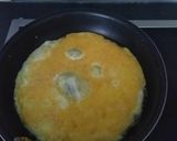 Une image de l'étape 2 de Omurice.