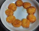 A picture of step 4 of Saganaki with Apricots and Graviera Cheese.