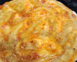 A picture of step 3 of Cheese Schezwan Pizza Frankie.