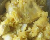 A picture of step 3 of "Mshenye"/smashed bananas and sweet potatoes.