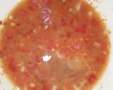A picture of step 2 of Three colour egg stuffed tomato.
