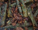 A picture of step 5 of Achari Bhindi.