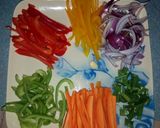 A picture of step 1 of Tricolour chicken stir fried noodles.