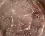 A picture of step 3 of Chocolate biscuit cake.