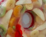 A picture of step 13 of Fruit Jello Cake.
