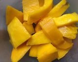 A picture of step 1 of Mango and pineapple smoothie.