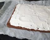 A picture of step 13 of Snickers Chocolate Roll Cake.