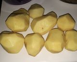 Foto del paso 2 de la receta Patatas especiadas al horno con huevo y virutas de jamón