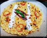 Foto del passaggio 8 della ricetta Risotto con Missoltino, Burrata e Cipolla Marinata