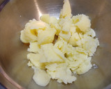 Foto del paso 4 de la receta: Patatas rellenas con pollo y pimientos