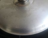 A picture of step 3 of Egg pizza on a pan.