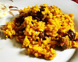 Foto del paso 4 de la receta: Arroz con churrasco y pollo al curry con aroma de tomillo
