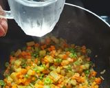 A picture of step 3 of Broken Wheat Upma.