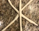 A picture of step 6 of Christmas wreath bread.