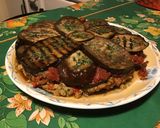 Une image de l'étape 12 de Aubergines grillées façon gâteau aux tomates, farce au chapon, pesto et emmental.