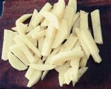 Foto del paso 3 de la receta: Milanesas de pollo con queso y papas fritas