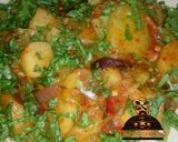 A picture of step 4 of Potatoes jollof with lettuce.