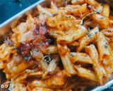 A picture of step 7 of Red sauce pasta.
