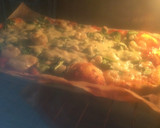 Foto del paso 7 de la receta: Pizza de espinacas, gambas y queso roquefort
