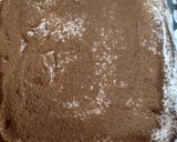 A picture of step 5 of Tiramisu with whipping cream.