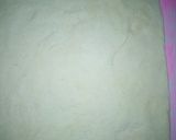 A picture of step 4 of Sweet potato curl rolls.
