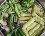 A picture of step 1 of Tangy Sindhi Kadhi.