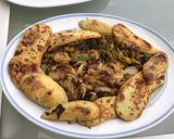 Une image de l'étape 10 de Pommes de terre grillées aux poivrons et oignons roses croustillants épicés.