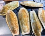 Une image de l'étape 3 de Aubergines farcies au bœuf, épices et légumes.