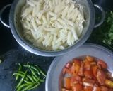 A picture of step 1 of Tomato and Garlic pasta.