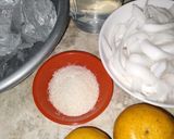 Foto langkah ke 1 dari resep Es Kelapa Muda Jeruk Peras.