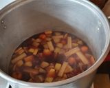 Foto del paso 3 de la receta: Ponche de frutas Navideño