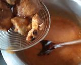 A picture of step 5 of Chicken 65 with sauce/Gravy.