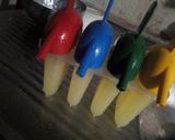 A picture of step 3 of Pineapple Popsicles.