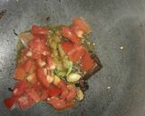 A picture of step 4 of Brinjal matar kheema.