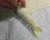 Foto del paso 3 de la receta: Rulos de hojaldre rellenos de chocolate y bañados con mermelada