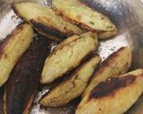 A picture of step 9 of Besan stuffed karela(bitter gourds).