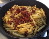 Une image de l'étape 9 de Bâtonnets de pommes de terre charlotte aux herbes aromatiques et tomates séchées.
