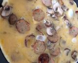 A picture of step 2 of Bangers and Mush Omelette.