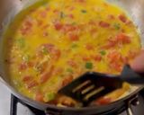 A picture of step 5 of Mexican Sunrise: Eggs with Serrano Pepper, Red Onion, and Tomato.