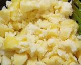 A picture of step 9 of Aloo walay nan.