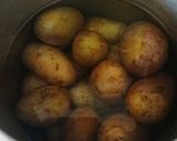 A picture of step 1 of Dum aloo (baked potatoes).