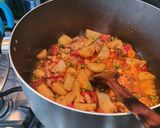 A picture of step 2 of Boneless chicken and vegetable rice.
