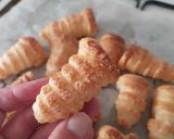 Foto del paso 10 de la receta Trenza brioche de crema y pepitas de chocolate con conitos de hojaldre