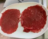 A picture of step 2 of Beef Carpaccio with Cilantro and Parmesan.
