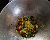 A picture of step 2 of Raw banana poha.