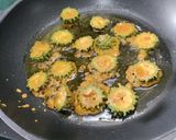 A picture of step 4 of Crispy Karela (Bitter gourd) potatoes.