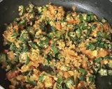 A picture of step 12 of Masaledar bhindi.
