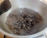 A picture of step 14 of Dry beef chilli.