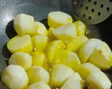 A picture of step 2 of Masala baby potatoes.