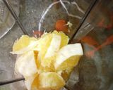 A picture of step 2 of Orange milkshake.